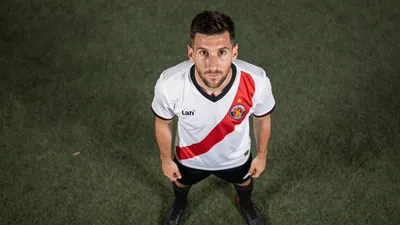 A photorealistic image of an anonymous Toulouse Football Club player, wearing a white jersey with a red stripe, a pair of...